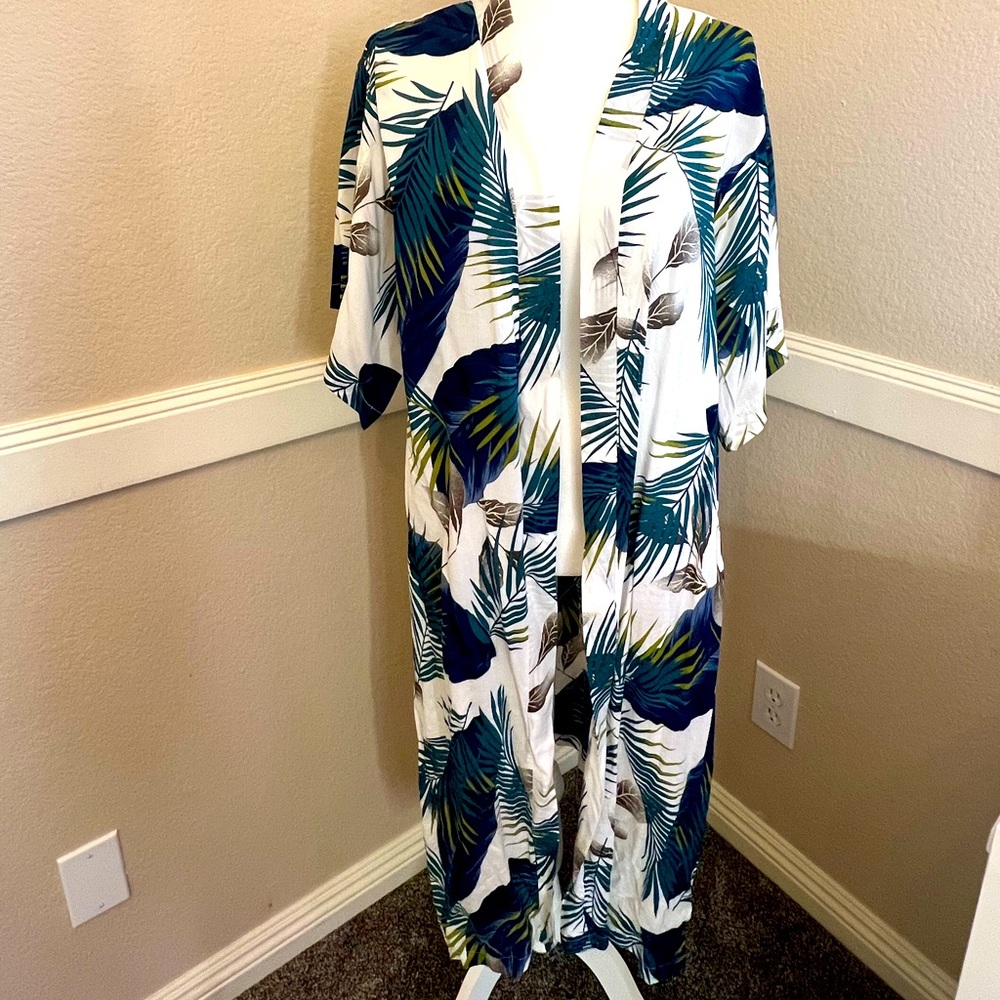 Long sheer duster. Great for beach or a light coverup.